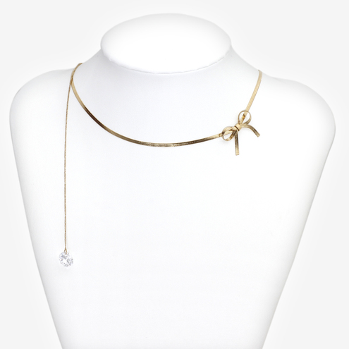 Collana metallo oro rodiato fiocco e filo zircone