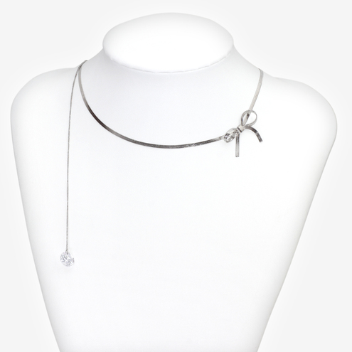 Collana metallo anallergico rodiato fiocco e filo zircone 